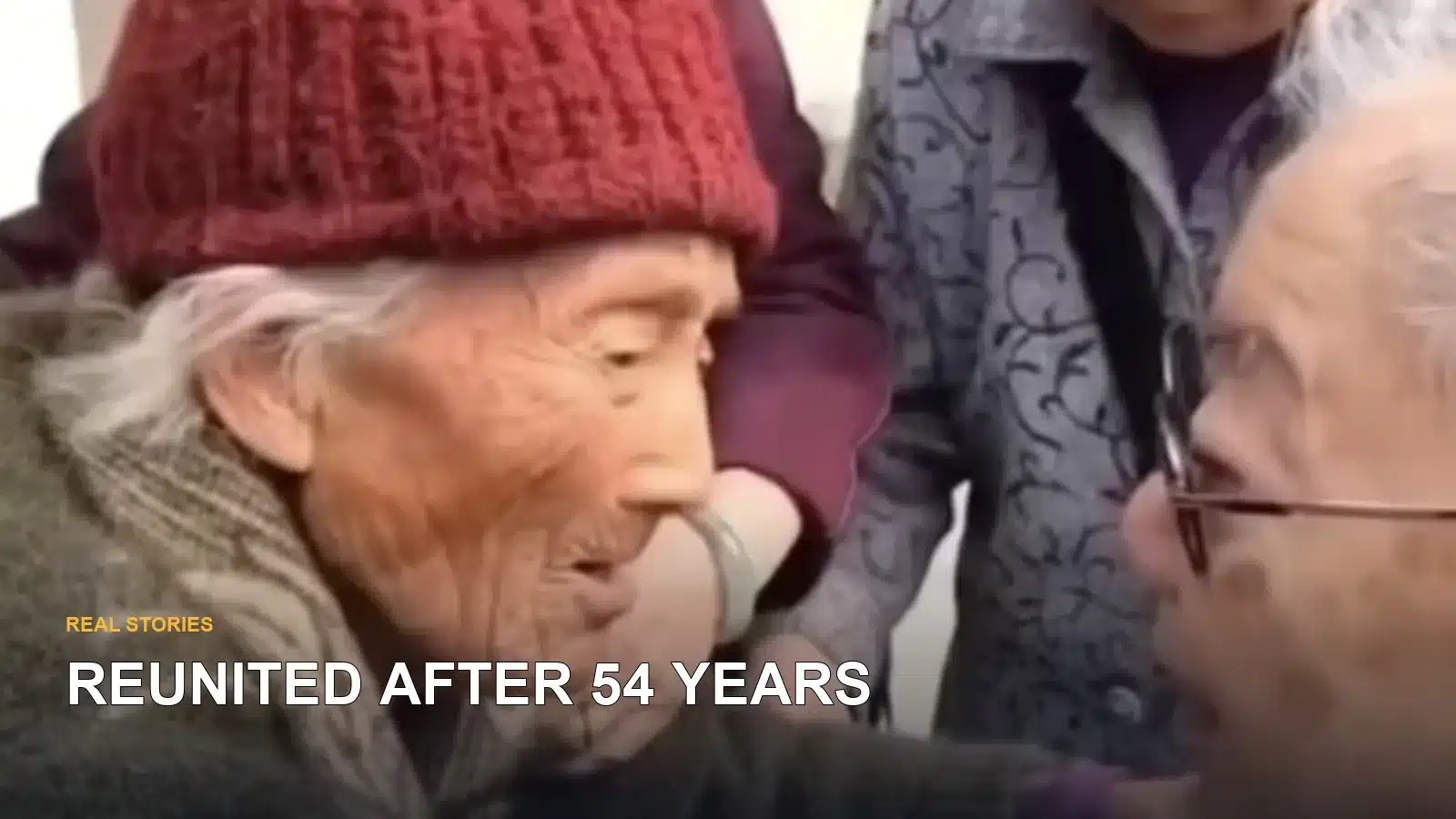 An elderly woman and man meeting again during an emotional reunion after decades apart